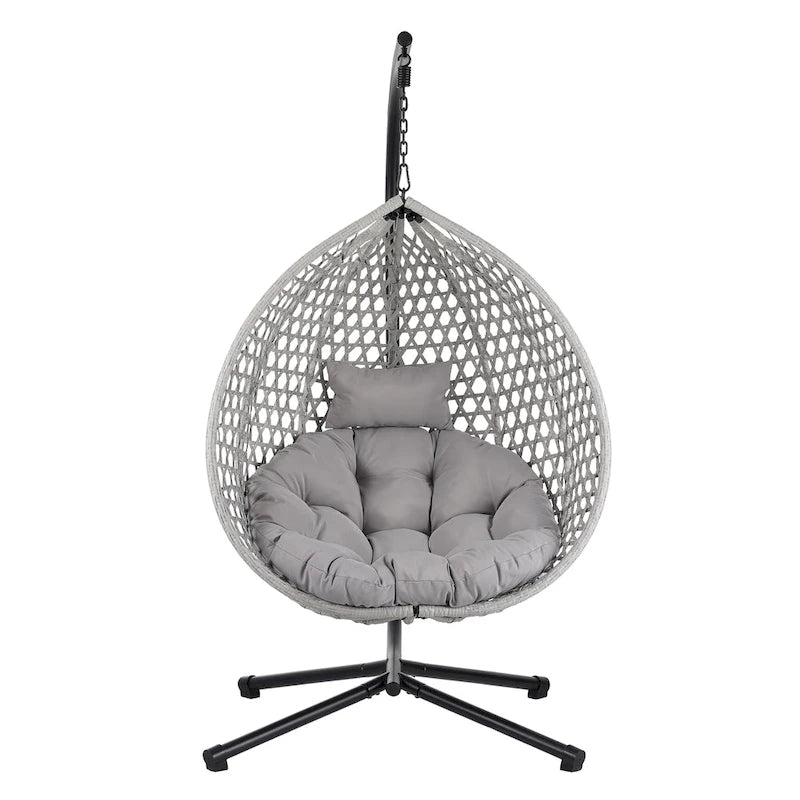 Fauteuil suspendu polyvalent pour l'intérieur et l'extérieur, en rotin PE, avec support et coussin.