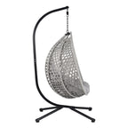 Fauteuil suspendu polyvalent pour l'intérieur et l'extérieur, en rotin PE, avec support et coussin.