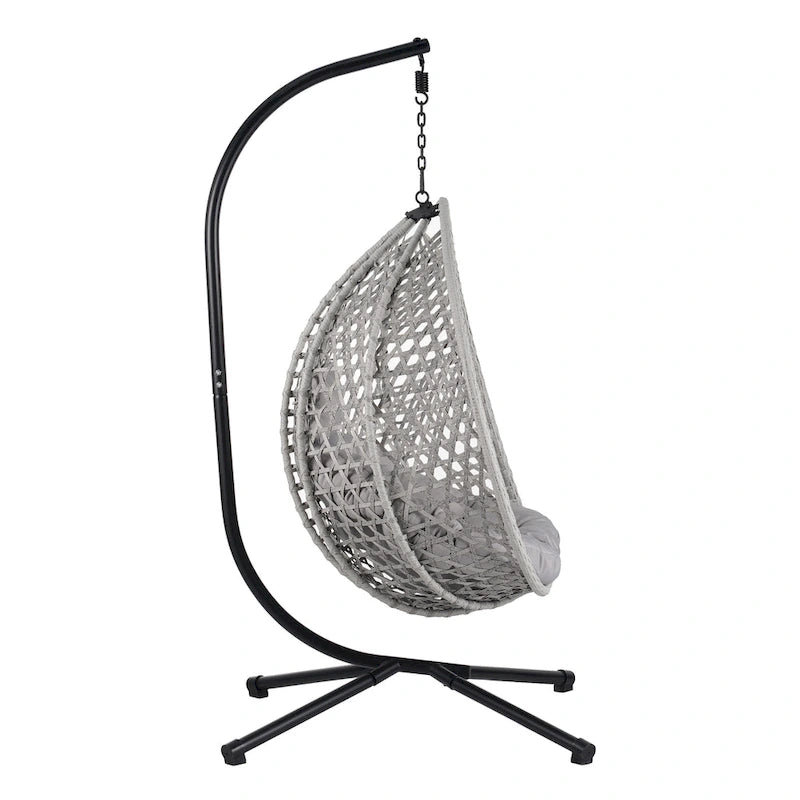 Fauteuil suspendu polyvalent pour l'intérieur et l'extérieur, en rotin PE, avec support et coussin.