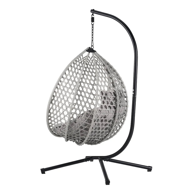 Fauteuil suspendu polyvalent pour l'intérieur et l'extérieur, en rotin PE, avec support et coussin.