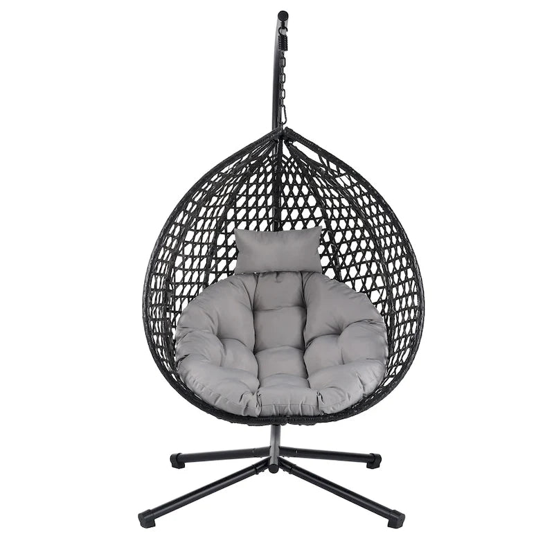 Fauteuil suspendu polyvalent pour l'intérieur et l'extérieur, en rotin PE, avec support et coussin.