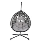 Fauteuil suspendu polyvalent pour l'intérieur et l'extérieur, en rotin PE, avec support et coussin.