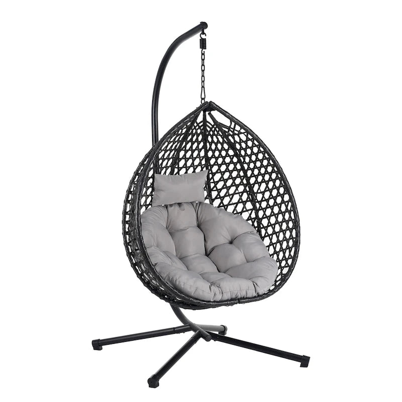Fauteuil suspendu polyvalent pour l'intérieur et l'extérieur, en rotin PE, avec support et coussin.