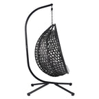 Fauteuil suspendu polyvalent pour l'intérieur et l'extérieur, en rotin PE, avec support et coussin.