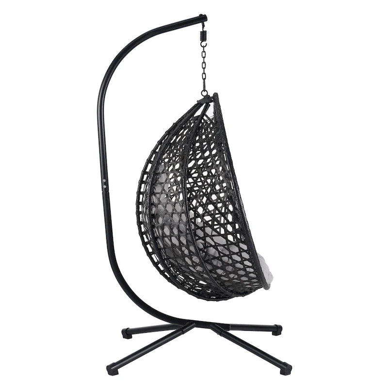 Fauteuil suspendu polyvalent pour l'intérieur et l'extérieur, en rotin PE, avec support et coussin.