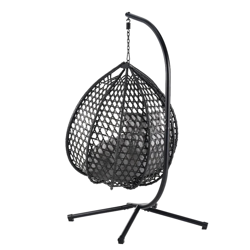 Fauteuil suspendu polyvalent pour l'intérieur et l'extérieur, en rotin PE, avec support et coussin.