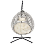 Fauteuil suspendu polyvalent pour l'intérieur et l'extérieur, en rotin PE, avec support et coussin.