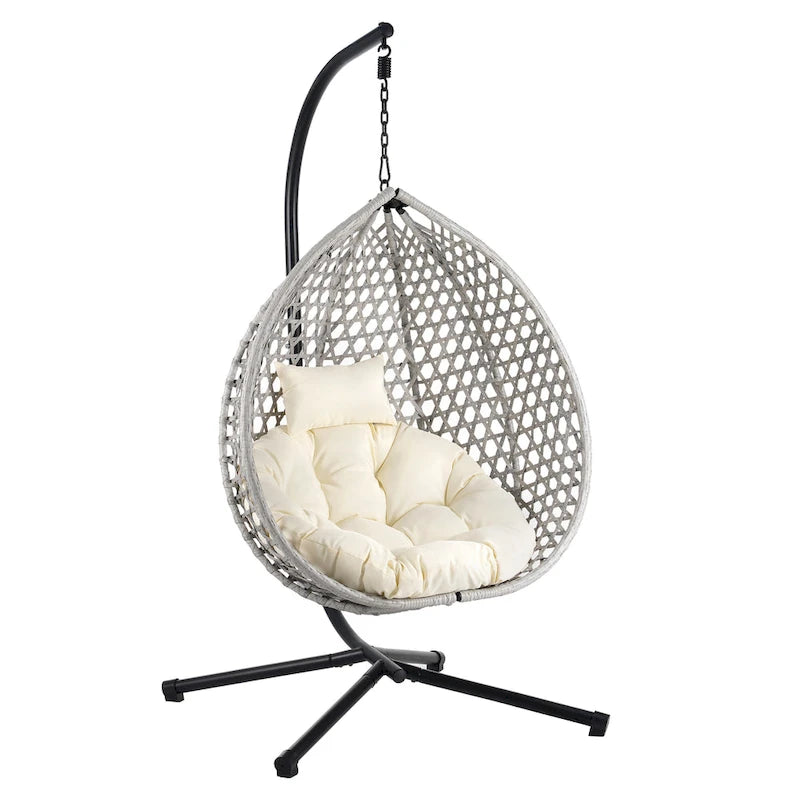 Fauteuil suspendu polyvalent pour l'intérieur et l'extérieur, en rotin PE, avec support et coussin.