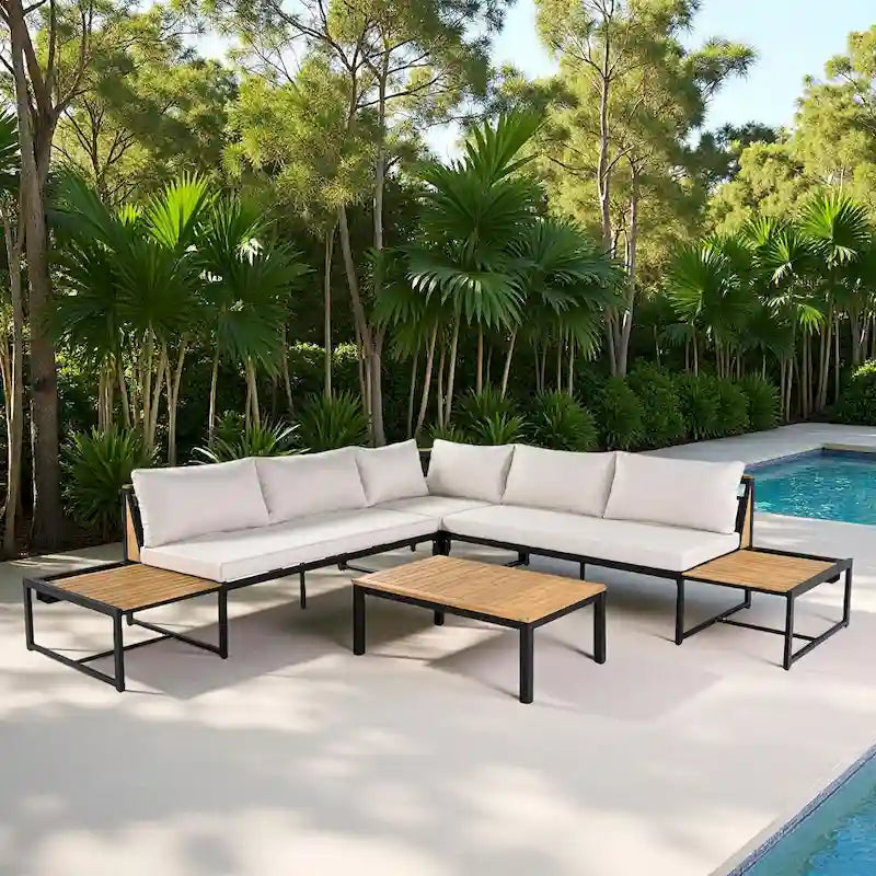 Ensemble de canapé d'angle en fer forgé 4 pièces pour terrasse, avec table basse et étagère de rangement latérale.