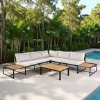 Ensemble de canapé d'angle en fer forgé 4 pièces pour terrasse, avec table basse et étagère de rangement latérale.