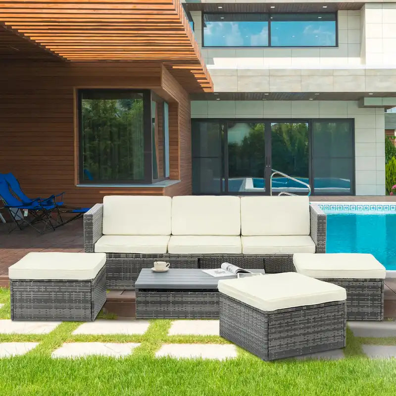 Ensemble de canapés d'extérieur 5 pièces en résine tressée PE, comprenant une table basse relevable et un canapé-lit. Ce mobilier de jardin comprend une table basse et un canapé-lit.