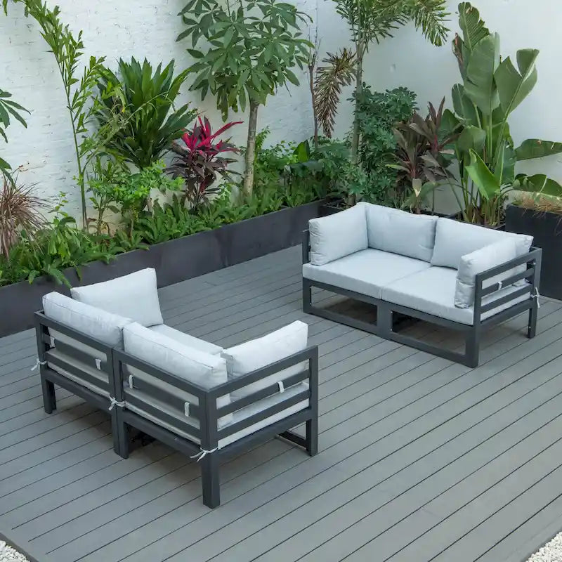 Ensemble de canapé d'angle 4 pièces LeisureMod Chelsea pour patio extérieur, en aluminium noir avec coussins
