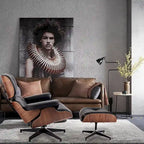 Fauteuil lounge pivotant HomeRoots 35 en cuir capitonné noir et marron avec repose-pieds - 34,6
