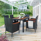 Ensemble repas de patio pour 6 personnes comprenant une table et des chaises en osier avec coussins