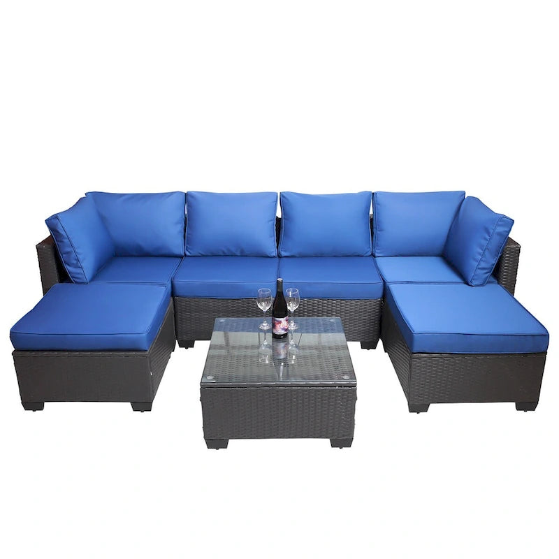 Ensemble de canapés de jardin 7 pièces noir et bleu foncé avec table basse et structure en métal antirouille.