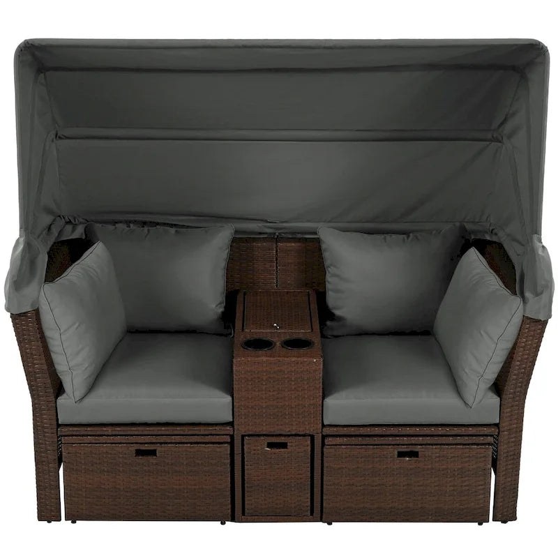 Ensemble canapé-lit convertible deux places pour terrasse avec pare-soleil rétractable, porte-gobelets, coffres de rangement et coussins déperlants.